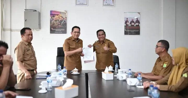 Pisah Sambut di Diskominfo Muba Herryandi Sinulingga Jabat Kadisnakertrans Resmi